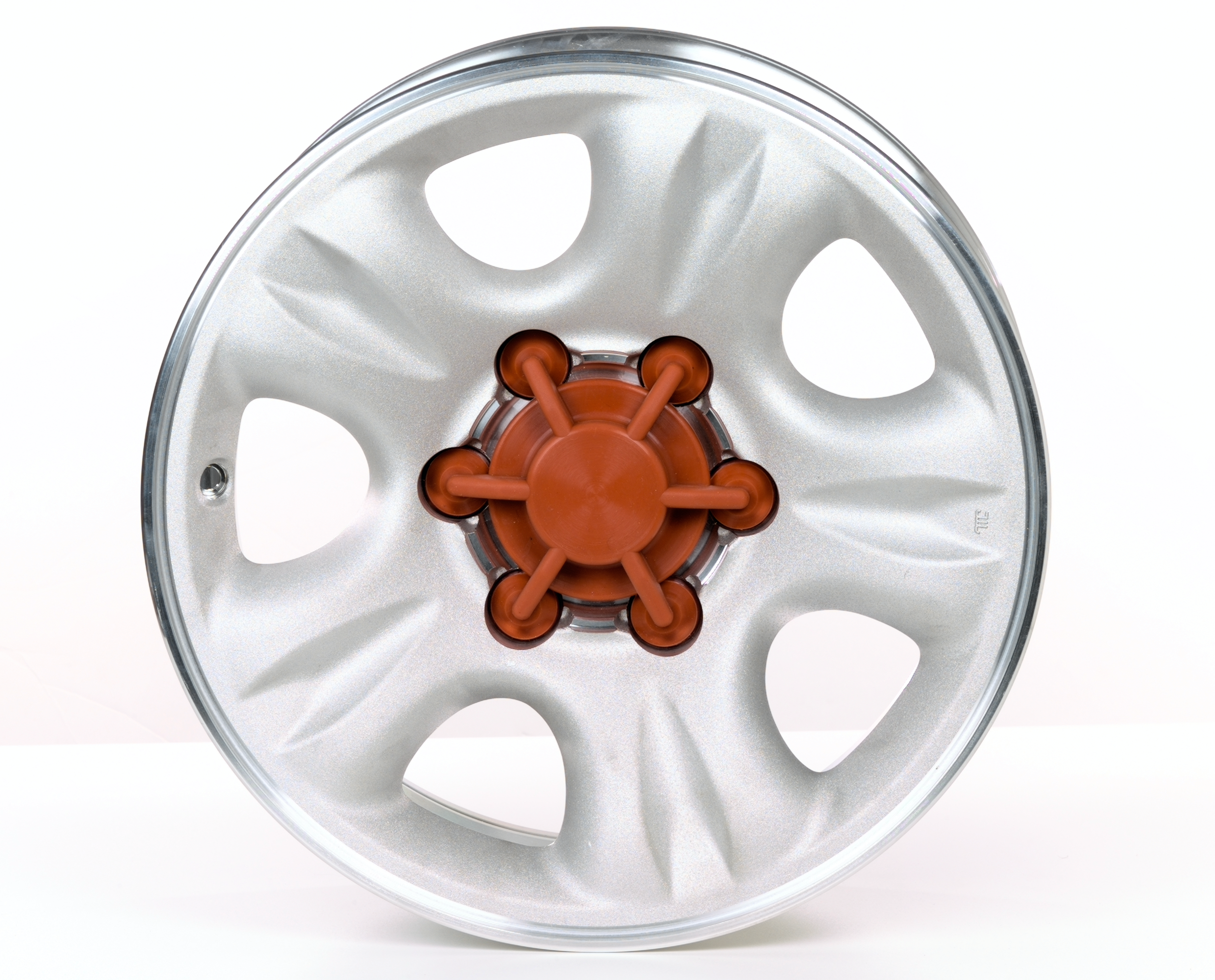 Custom molded mask installed on a wheel